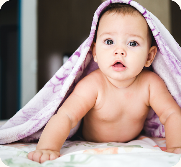 A baby wrapped in a blanket